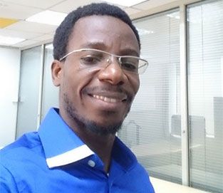 Close-up of person with glasses smiling