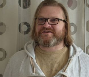 Man with beard and glasses