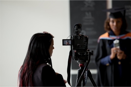 Arden University graduate having official graduation photos taken