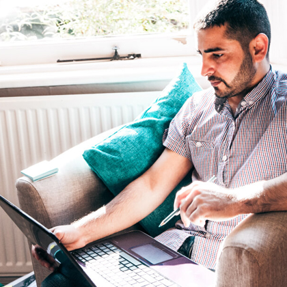 Arden University student studying online at home