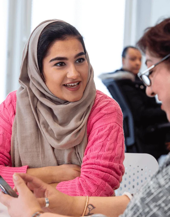 Arden University student talking to tutor
