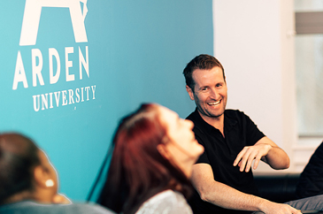 Arden University students laughing